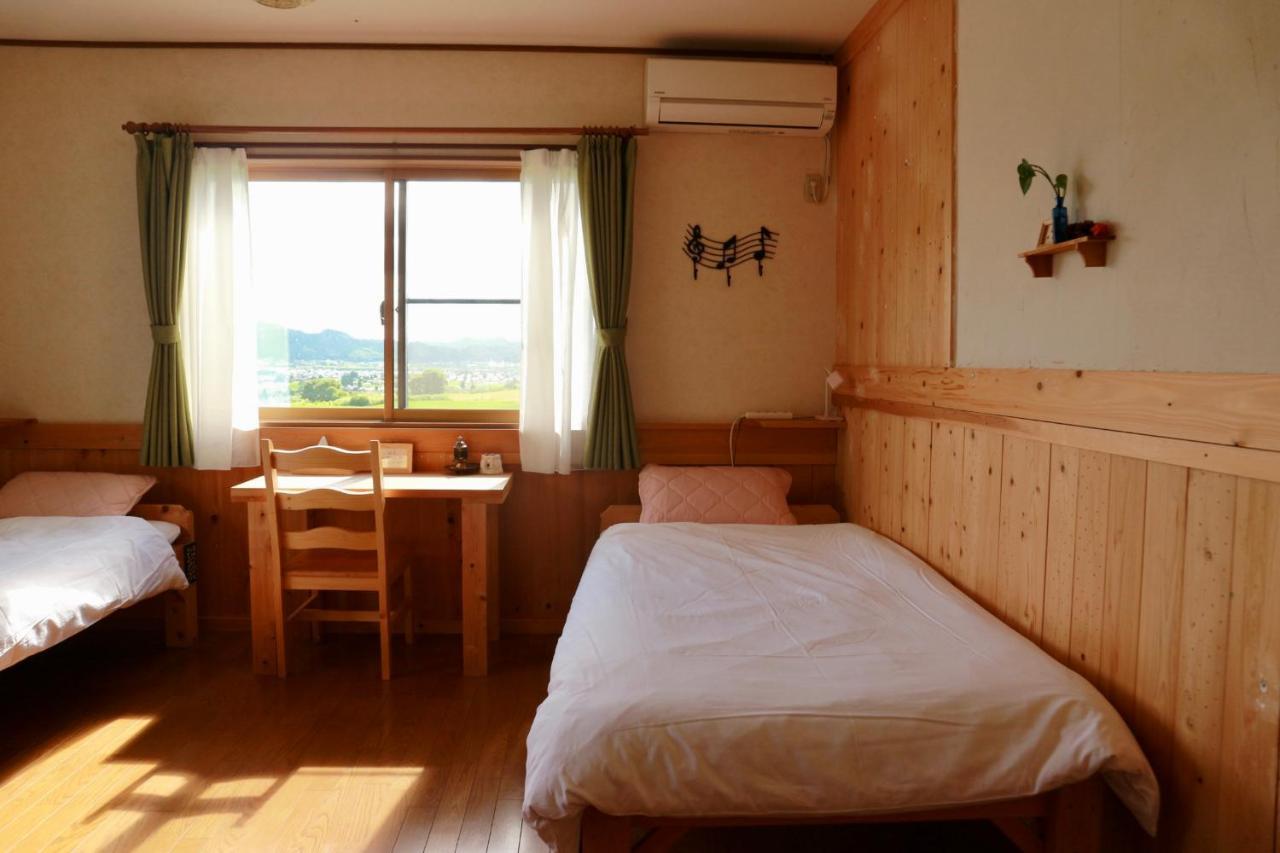 Готель Azumino Backpackers 山の風 Matsukawa Екстер'єр фото