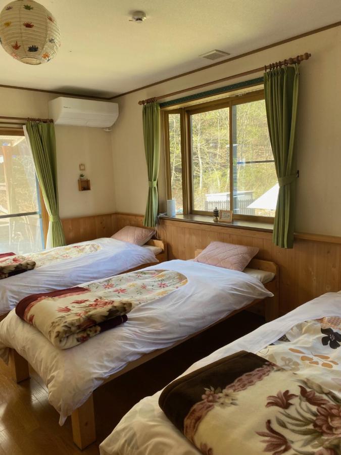 Готель Azumino Backpackers 山の風 Matsukawa Екстер'єр фото