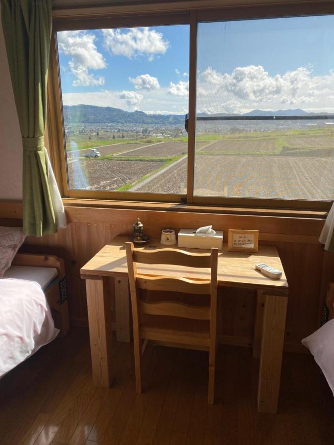 Готель Azumino Backpackers 山の風 Matsukawa Екстер'єр фото
